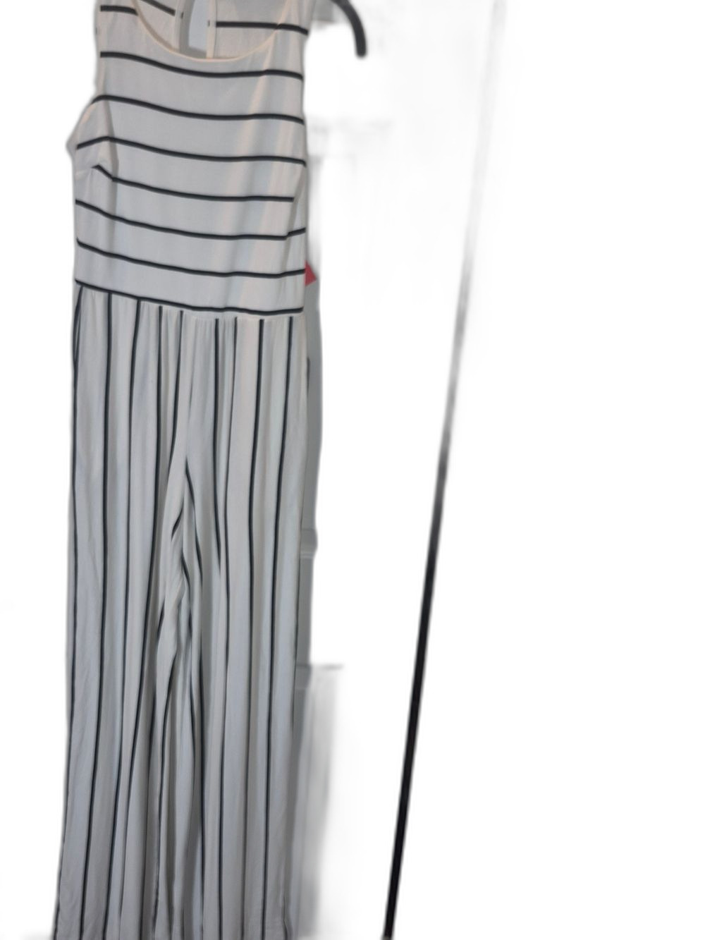 Sleeveless White Jumpsuit with Black Stripe Detail